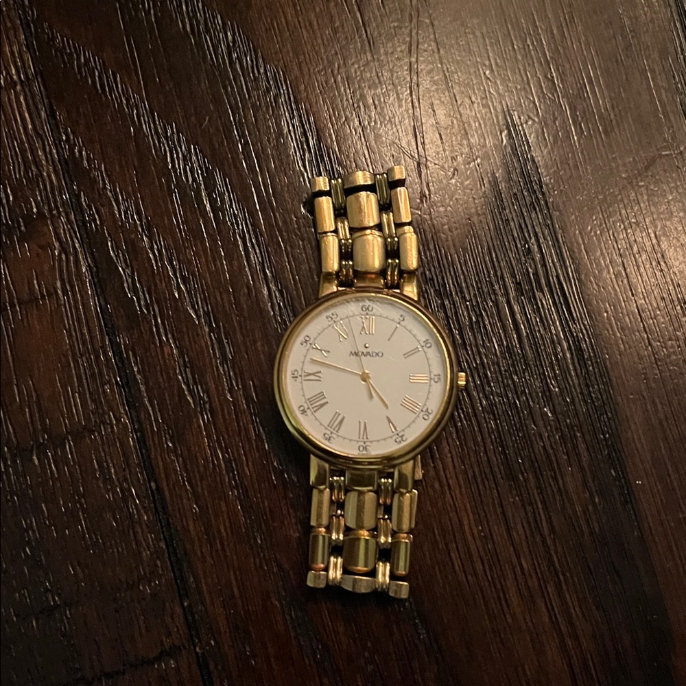 Movado Gold Tone Bracelet Watch with White Dial
